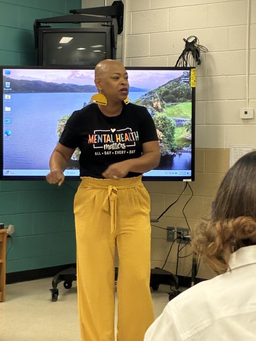 ShDonna Drumgoole speaking with youth in a classroom